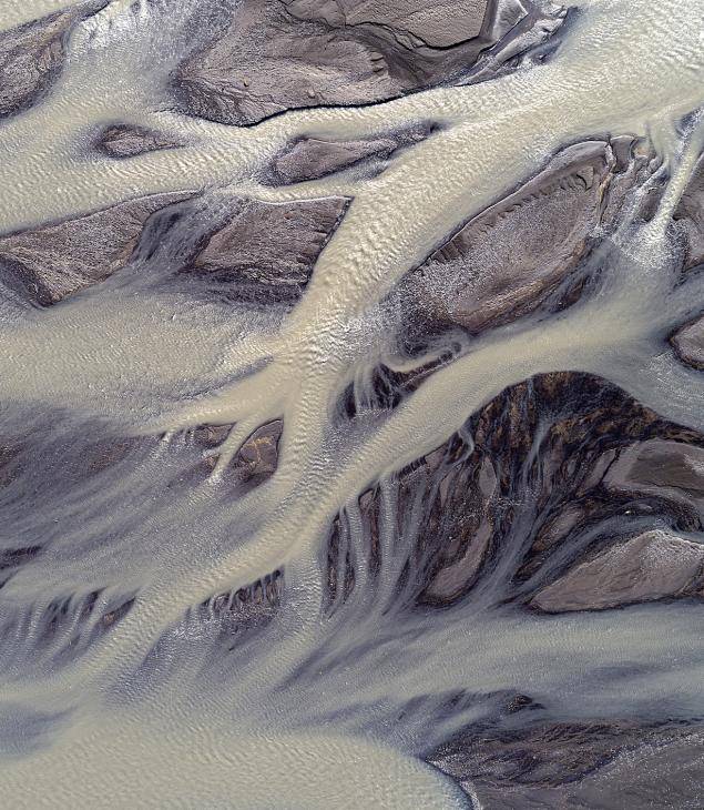 Glacial river flows Iceland 